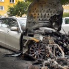 Burnt Benzes in Berlin; Unrepaired Cars Here